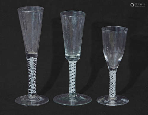 Three 18th century air twist glasses, tallest 19cm (3)