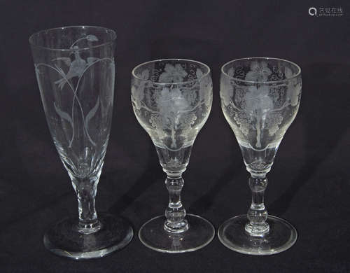 Pair of 18th century style wine glasses, finely engraved with fruiting vines above a double