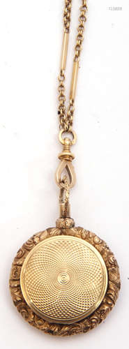 Unmarked Victorian gold circular vinaigrette, the engine turned lid opening to reveal a foliate