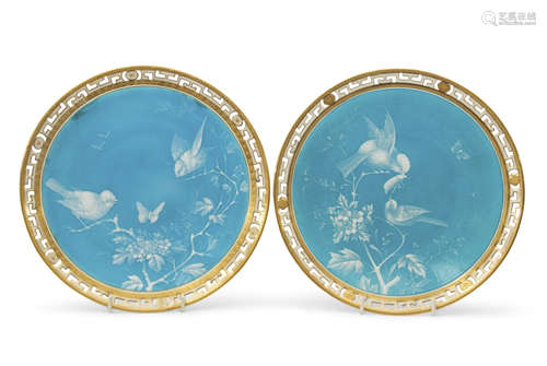 Pair of 19th century Minton plates with enamel decoration of birds on a turquoise ground within