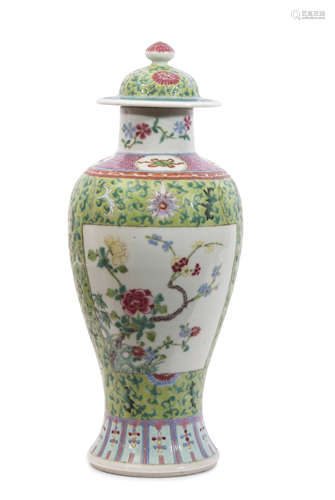 Chinese late 19th century vase and cover, the green ground with polychrome decoration of flowers