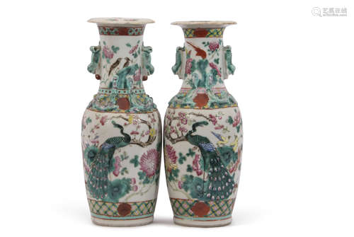 Pair of Chinese vases with polychrome decoration of dragons and birds with relief decoration of