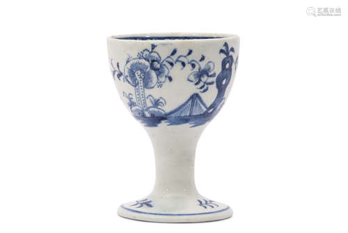 Rare Lowestoft porcelain egg cup with a chinoiserie design to exterior, floral sprig to base and