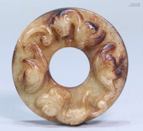 A HETIAN JADE BI CARVED WITH BEAST