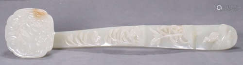 A HETIAN JADE RUYI CARVED WITH BIRD&FLOWER