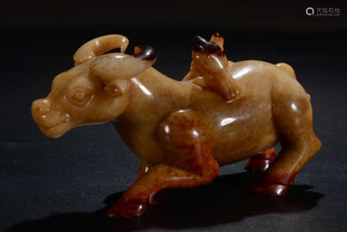 A HETIAN JADE COW PENDANT