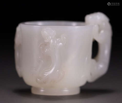 A HETIAN JADE CUP CARVED WITH BEAST