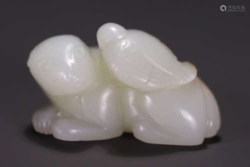 A HETIAN JADE BEAST PENDANT