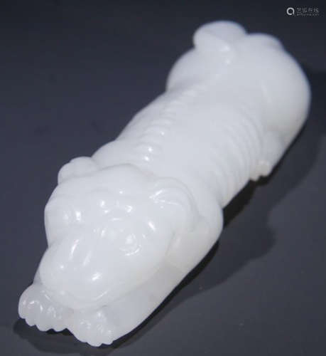 A HETIAN JADE DOG PENDANT