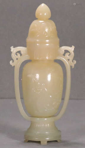 A HETIAN JADE VASE WITH BEAST EARS