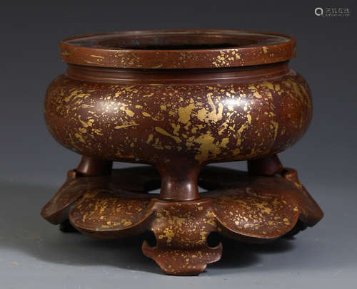 A COPPER CENSER WITH FLOWER SHAPED BASE