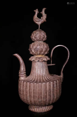 A SILVER POT CARVED WITH FLOWER PATTERN