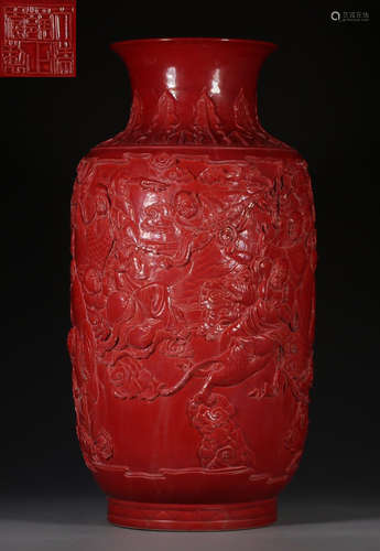 A RED LACQUER VASE CARVED WITH ARHAT