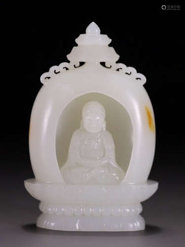 A HETIAN JADE BUDDHA WITH PAGODA