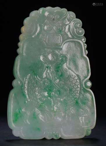 A JADEITE TABLET CARVED WITH FISH