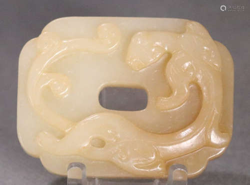 A HETIAN JADE PENDANT CARVED WITH BEAST