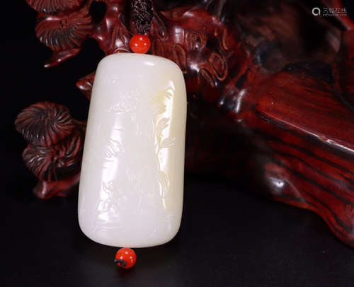 A HETIAN JADE PENDANT CARVED WITH STORY