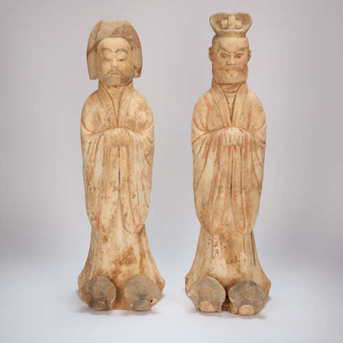 A PAIR OF CHINESE POTTERY CIVIL OFFICIALS