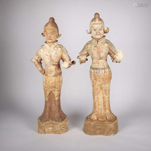 A PAIR OF  CHINESE POTTERY WARRIOR FIGURINES