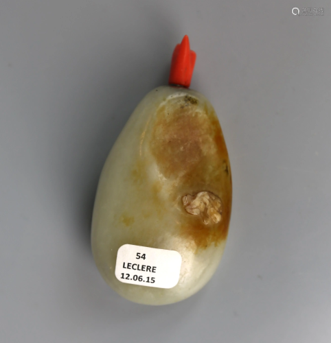 a chiense jade snuff bottle with skin