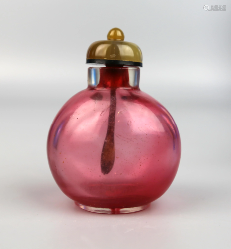 a chinese red glass snuff bottle