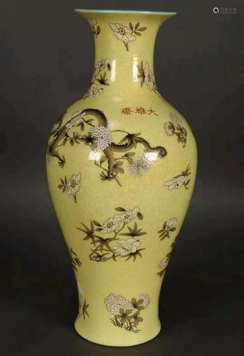 A Chinese vase in white and gray tones on a yellow