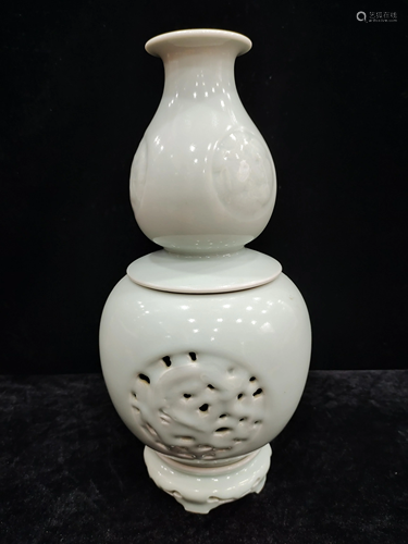 A chinese celadon glazed revolving vase