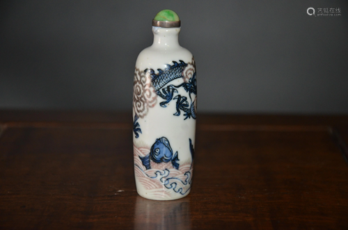 red snuff bottle in blue and white glaze