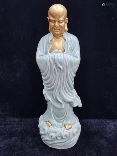 A chinese celadon glazed figure