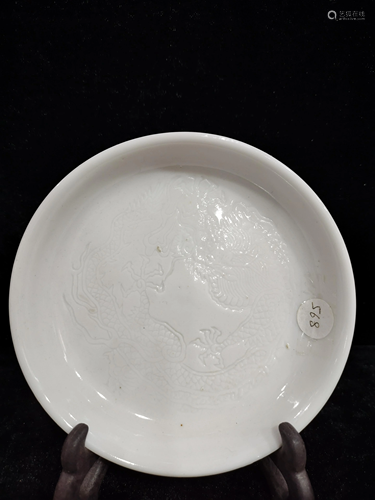 A chinese white glazed dragon dish