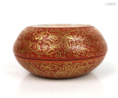 a chinese iron red ink box