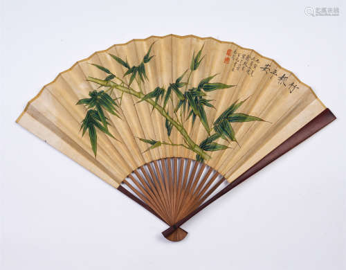 CHINESE FLODING FAN WITH PAINTING OF BAMBOOS ON IT