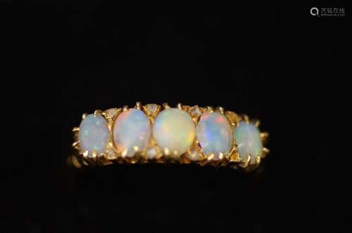 18 ct gold ring set with 5 opals size- N