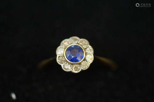 18 ct gold ring set with 10 diamonds and central s