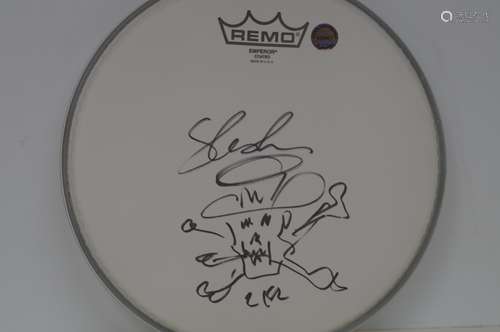 Drum head signed with a drawing by SLASH- Saul Hud