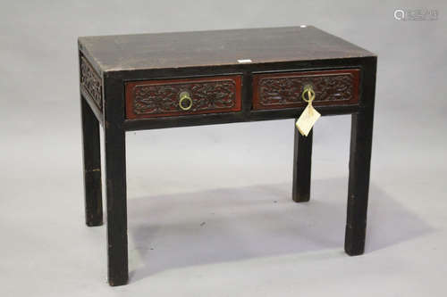 A Chinese softwood and red lacquered side table, late Qing dynasty, the rectangular panelled top