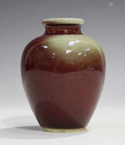 A Chinese sang-de-boeuf glazed vase, 20th century, of ovoid form, height 11cm.Buyer’s Premium 29.