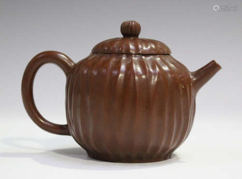 A Chinese polished Yixing stoneware teapot, probably 20th century, of ribbed globular form,