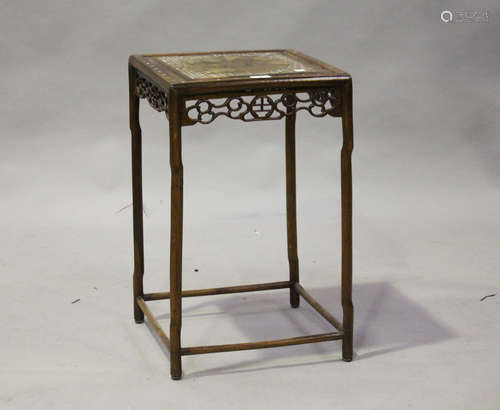 A Chinese hardwood occasional table, late 19th century, the square panelled top inlaid in mother-