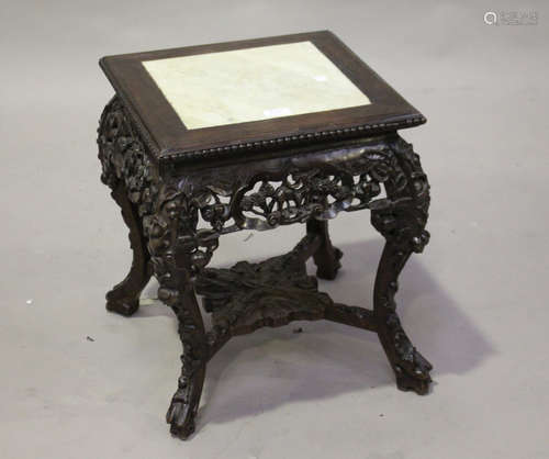 A Chinese hardwood stand, late 19th/early 20th century, the square top inset with a marble panel