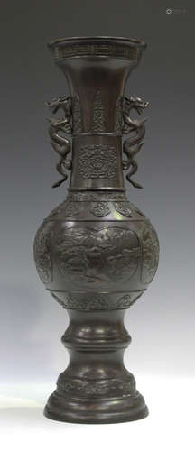 A Japanese brown patinated bronze vase, Meiji period, the globular body cast with landscape panels