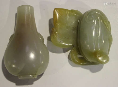 A Chinese jade snuff bottle, late Qing dynasty, of hu form, carved in low relief with a pair of lion