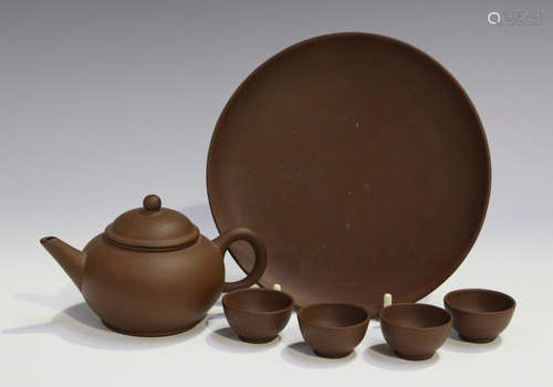 A Chinese Yixing stoneware miniature tea set, 20th century, comprising a teapot and cover of squat