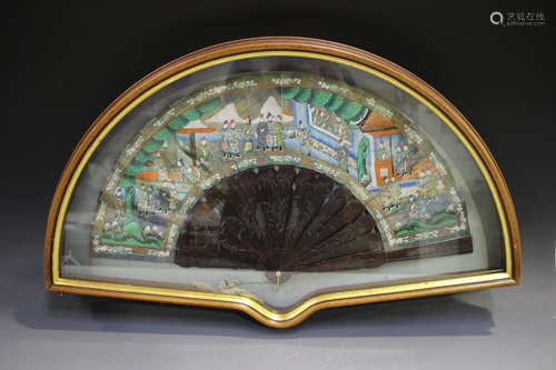 A Chinese Canton export lacquer folding fan, mid-19th century, the brown lacquered guards and