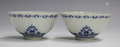 A pair of Chinese blue and white porcelain wine cups, mark of Yongzheng but later, of hemi-spherical