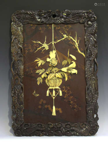 A Japanese inlaid lacquer panel, Meiji/Taisho period, decorated in ivory and bone with a hanging