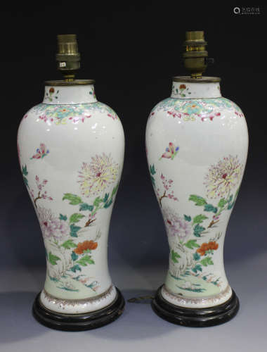 A pair of Chinese famille rose export porcelain vases, Qianlong period, each of baluster form,