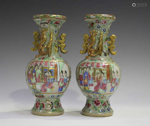 A pair of Chinese Canton famille rose enamelled celadon ground porcelain vases, mid to late 19th