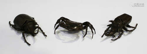 A group of three South-east Asian brown patinated bronze figures, modern, comprising a crab,