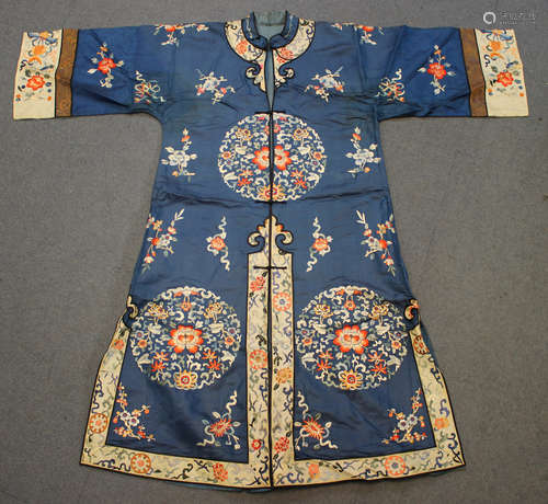 A Chinese blue silk embroidered jacket/robe, early 20th century, finely worked in coloured threads